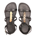 sandalia barefoot bonita negra con tachuelas doradas para mujer