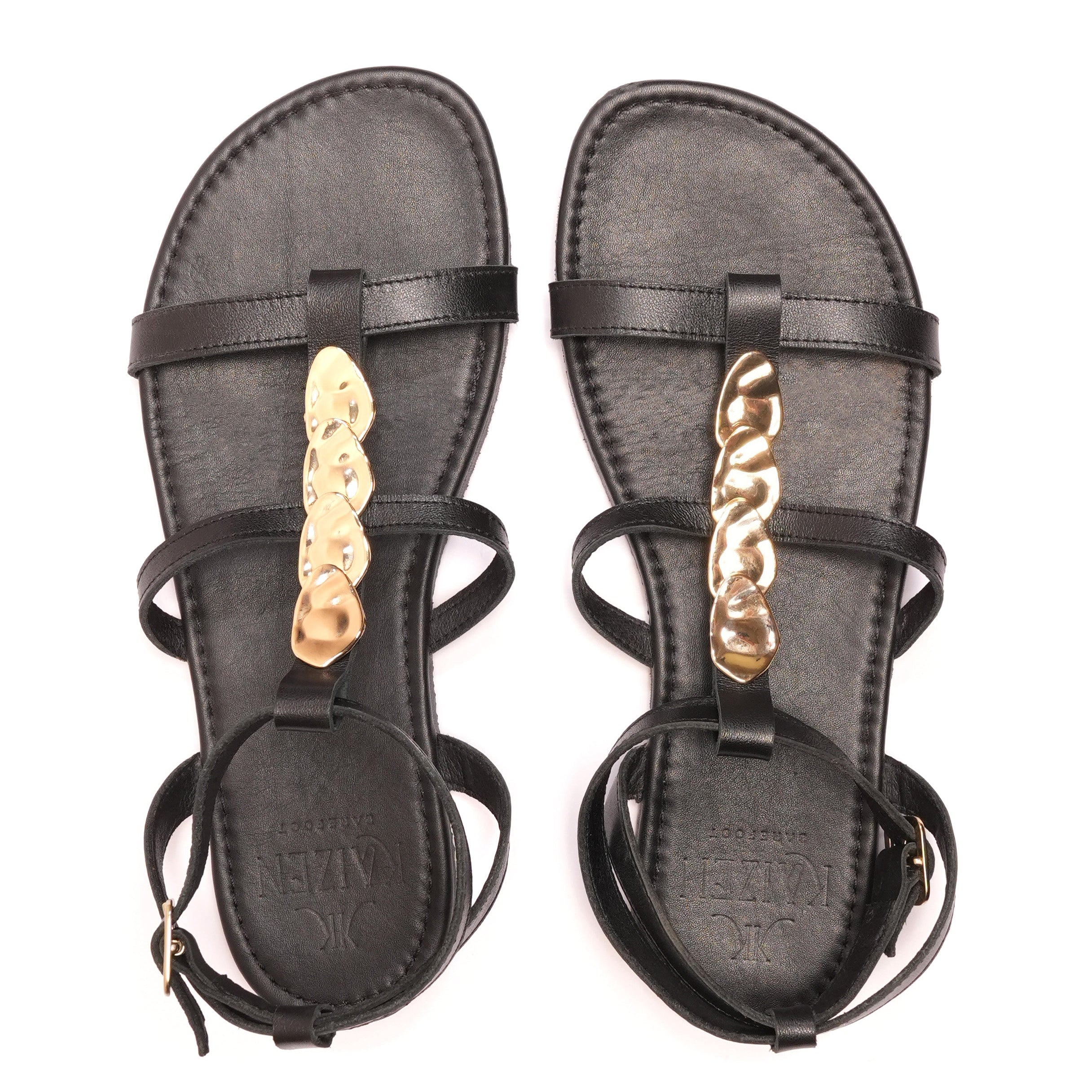 sandalia barefoot bonita negra con tachuelas doradas para mujer